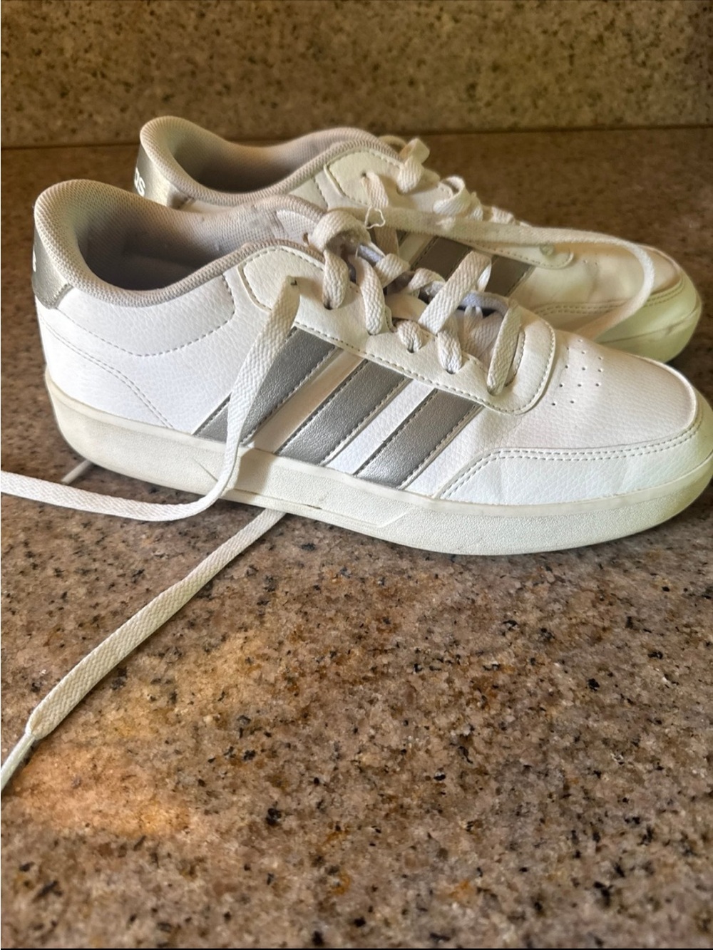 Adidas White tennis shoes with Gray Stripes